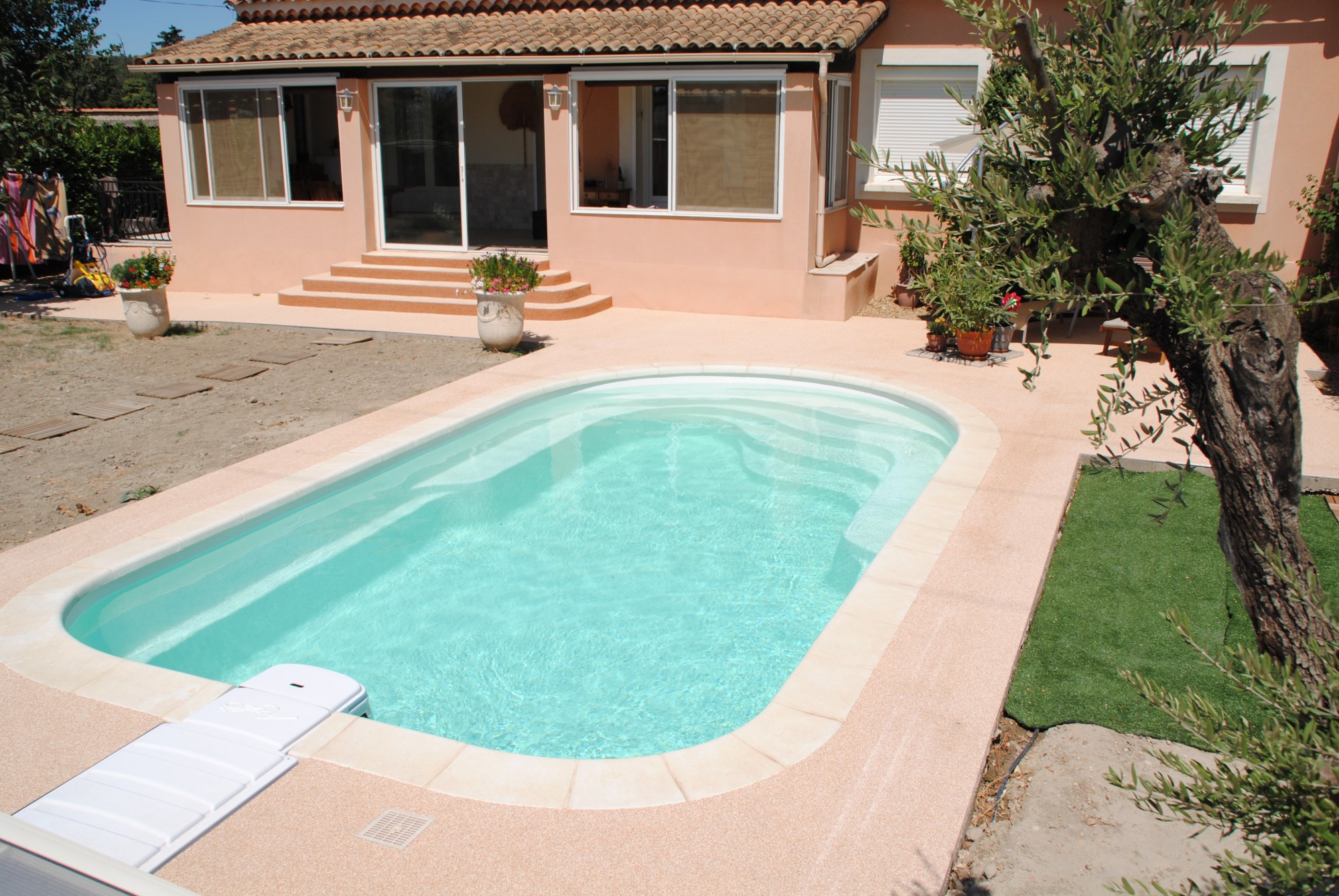 Photo d'une piscine coque 7X4 avec installation sur Bordeaux