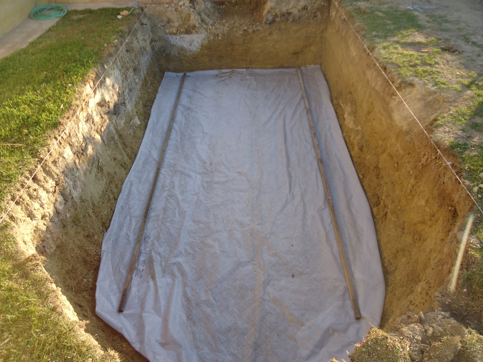 pose d'un géotextile en fond de terrassement